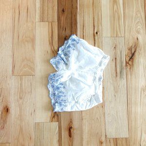 Old navy, white shorts with blue flower design